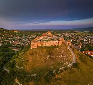 Veszprem Prints: Sumeg, Hungary - Aerial panoramic view of the famous High Castle of Sumeg in Veszprem county at sunset with storm
