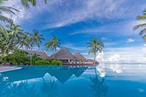 Images Dated 1st November 2019: Summer luxury tourism landscape. Luxurious beach resort swimming pool reflection