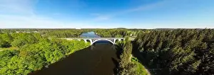 Summer panoramic aerial view of bridge and Kymijoki river waters in Finland, Kymenlaakso, Kouvola, Koria