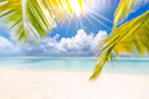 Summer tropical sea with sparkling waves and blue sunny sky, wonderful stunning summer scenery. Beach landscape, amazing blurred view