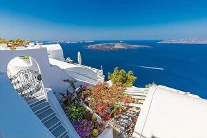 Images Dated 24th July 2021: Summer vacation urban scenic of luxury famous destination. White architecture in Santorini, Greece