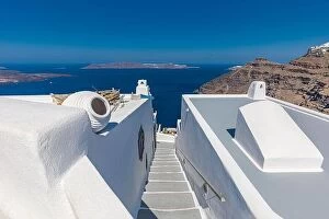 Images Dated 24th July 2021: Summer vacation urban scenic of luxury famous destination. White architecture in Santorini, Greece