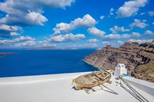Summer vacation urban scenic of luxury famous destination. White architecture in Santorini, Greece. Perfect travel scenery with terrace sunny blue sky