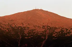 New Hampshire Prints: The summit of Mt Washington glows red at sunset in the White Mountains, New Hampshire, USA