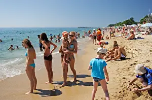 Suntan Prints: sunbathing people on the beach of Golden Sands in Varna