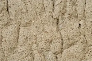 Simple Living Prints: Sunja, Croatia, April 22,2022 : Facade of mud and straw on old wooden house.