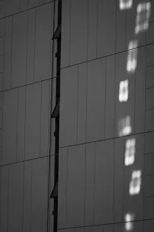 Depth Of Field Prints: The sunlight shining on the apartment building