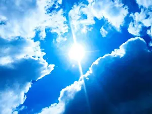 Cumulus Prints: Sunny background, blue sky with white clouds and sun