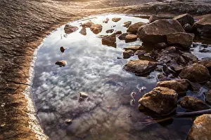 Glory Prints: Sunrise captured in a rock depression of Devil's Den on the Gettysburg National Military Park