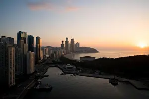 Sunrise at Haeundae beach in Busan. Haeundae beach is Busan's most popular beach in South Korea