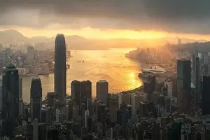 Sunrise over Hong Kong Victoria Harbor from Victoria Peak with Hong Kong and Kowloon below