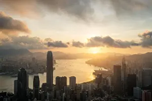 Sunrise over Hong Kong Victoria Harbor from Victoria Peak with Hong Kong and Kowloon below