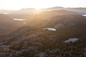 Images Dated 21st August 2019: Sunrise illuminates the Desolation Wilderness, a federally protected wilderness area just west of