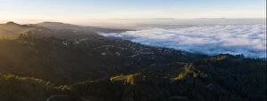 Aerial Landscape Collection: Sunrise illuminates the ever-present marine layer that drifts into the San Francisco Bay Area of