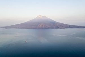 Images Dated 26th September 2019: Sunrise illuminates the Iliape volcano found just east of Flores, Indonesia