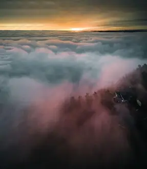 Morning Sky Prints: Sunrise in the Mountains with a lot of Fog