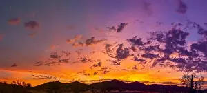 Sunset View Prints: Sunrise panorama over the sonoran desert of Arizona with layers of mountains shot at altitude by a drone