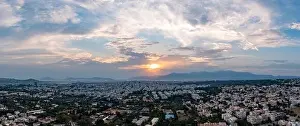 Penteli Prints: Sunset over Athens, Greece. Aerial drone panoramic view from Penteli mount