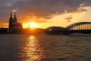 Rhein Prints: Sunset between Cologne Cathedral (Kölner Dom) and Hohenzollern Bridge across the river Rhine