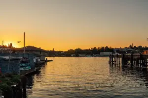 Houseboat Prints: sunset from Eastlake in Seattle with seaplane landing on Lake Union