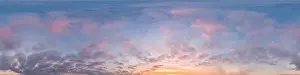 Sunset sky panorama with bright glowing pink Cumulus clouds