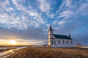 Saskatchewan Prints: Sunset over a vast sky and the historic yet abandoned Zion Lutheran Church of the Flowing Well near Hodgeville