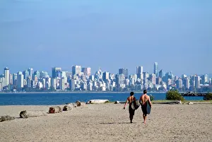 Weekend Prints: Two surfers walking on beach in Vancouver Canada