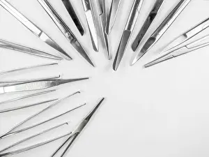 Gleaming Prints: surgical instruments arranged in a pattern 2