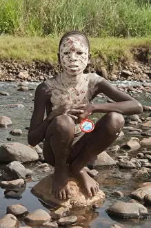 Surma boy with body paintings, Kibish, Omo River Valley, Ethiopia