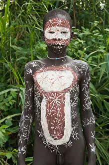 Surma boy with body paintings, Kibish, Omo River Valley, Ethiopia Africa
