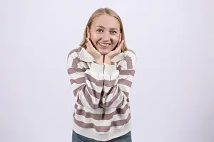 Miracle Prints: Surprised woman holding her face with both hands