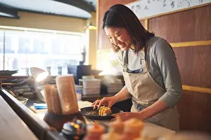 Smell Prints: Sushi, restaurant worker and woman with smile from food and Asian meal in a kitchen