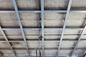 Gypsum Prints: Suspended ceiling structure, before installation of gypsum plasterboard