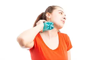 Suffering Prints: Sweating attractive young woman cooling with bottle of water touching her neck as summer hot temperature concept
