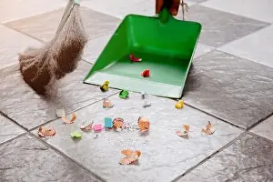 Scoop Prints: Sweep up scraps of paper and dust on tile floors with a broom and a plastic dustpan