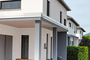 Apartment Buildings Prints: Symbolic image real estate: Detail of modern white detached houses in a new building area