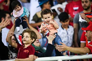 Syrian Prints: Syrian football fans cheer in the AFC Asian Cup Group B match between Syria and Australia in Al Ain