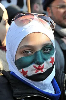 Syrian Prints: Syrian woman with the Syrian flag painted on her face