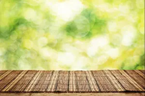 Beams Prints: Empty table and defocused fresh green background