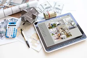 Footage Prints: Tablet with view from CCTV cameras and different equipment on white table