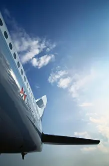 Outsides Prints: tail-fin and horizontal-stabiliser of a Cathay Pacific Airways Boeing 777-300