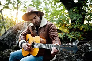 Entertain Prints: Talented bearded male musician in hat