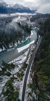Tall colorful wilderness backroad drone shot in Washington State