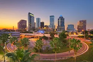 Tampa, Florida, USA downtown city skyline over roads and highways at dusk