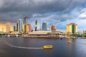 Images Dated 20th July 2017: Tampa, Florida, USA downtown skyline on the bay at dusk with water traffic