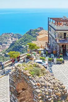 Taormina and the Ionian coast view from Castelmola main square, Castelmola, Taormina, Sicily, Italy