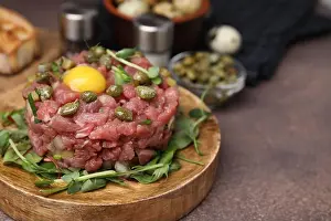 Minced Prints: Tasty beef steak tartare served with yolk