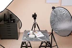 Stylist Prints: Tasty macarons with glass of milk on table in professional photo studio