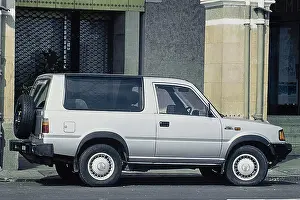 Sierra Prints: Tata Sierra profile white car parked on street, Bombay, Mumbai, India, Asia