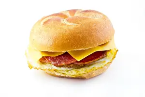 Messy Prints: Taylor ham, pork roll, egg and cheese breakfast sandwich on a kaiser roll from New Jersey
